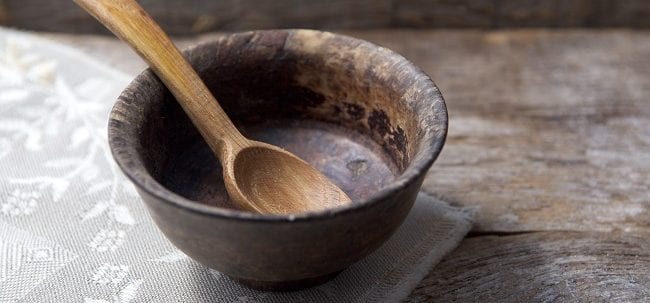 Wooden spoon in wooden bowl - Healthy Hildegard