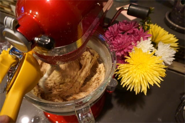 a kitchen aid mixer mixes the spelt flour bread ingredients